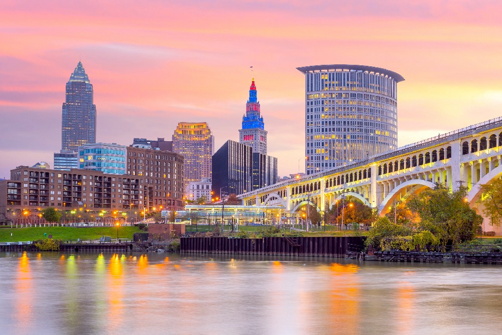 view of downtown Cleveland skyline in Ohio at twilight