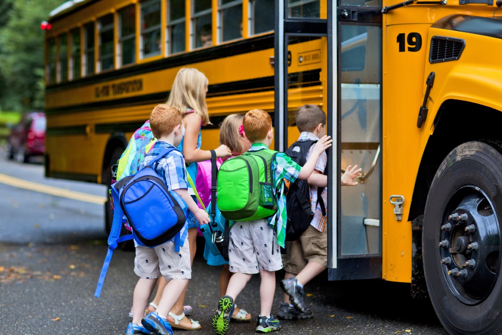 kids boarding school bus