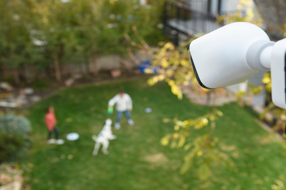 outdoor camera backyard view of family