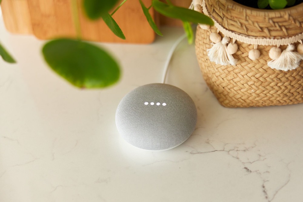 Mother and daughter using Amazon Echo