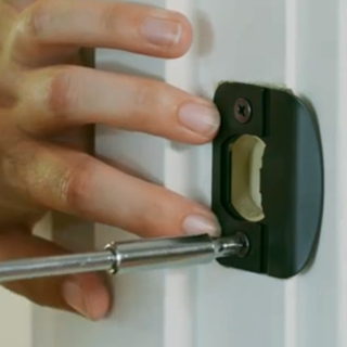 smart lock deadbolt binding fix strike plate spring tab adjustment with shim