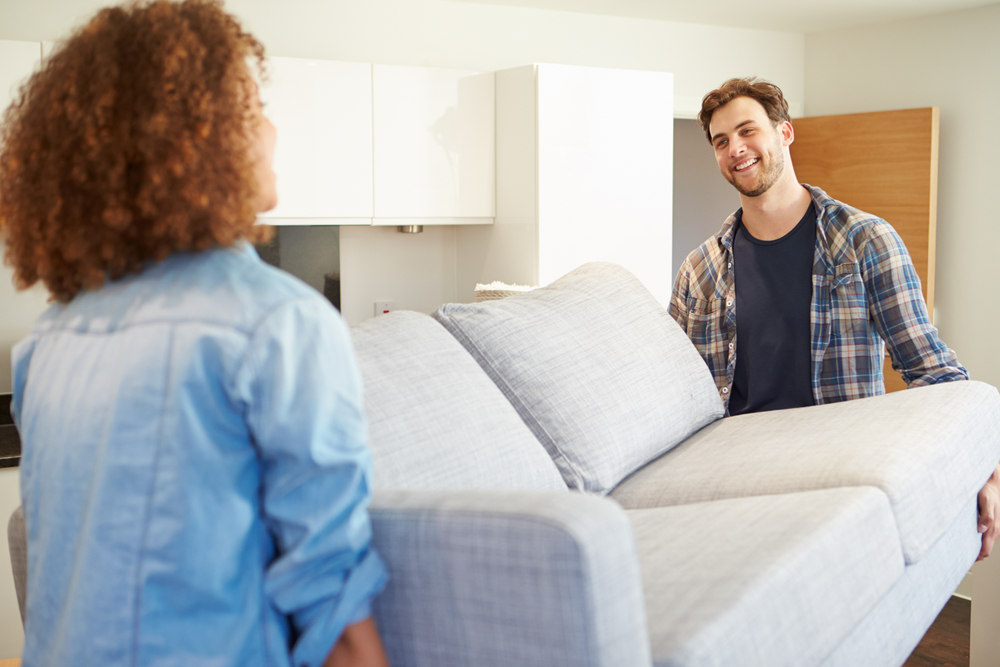 woman man moving couch