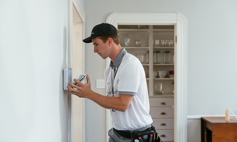 Vivint Pro installing a Vivint smart home system